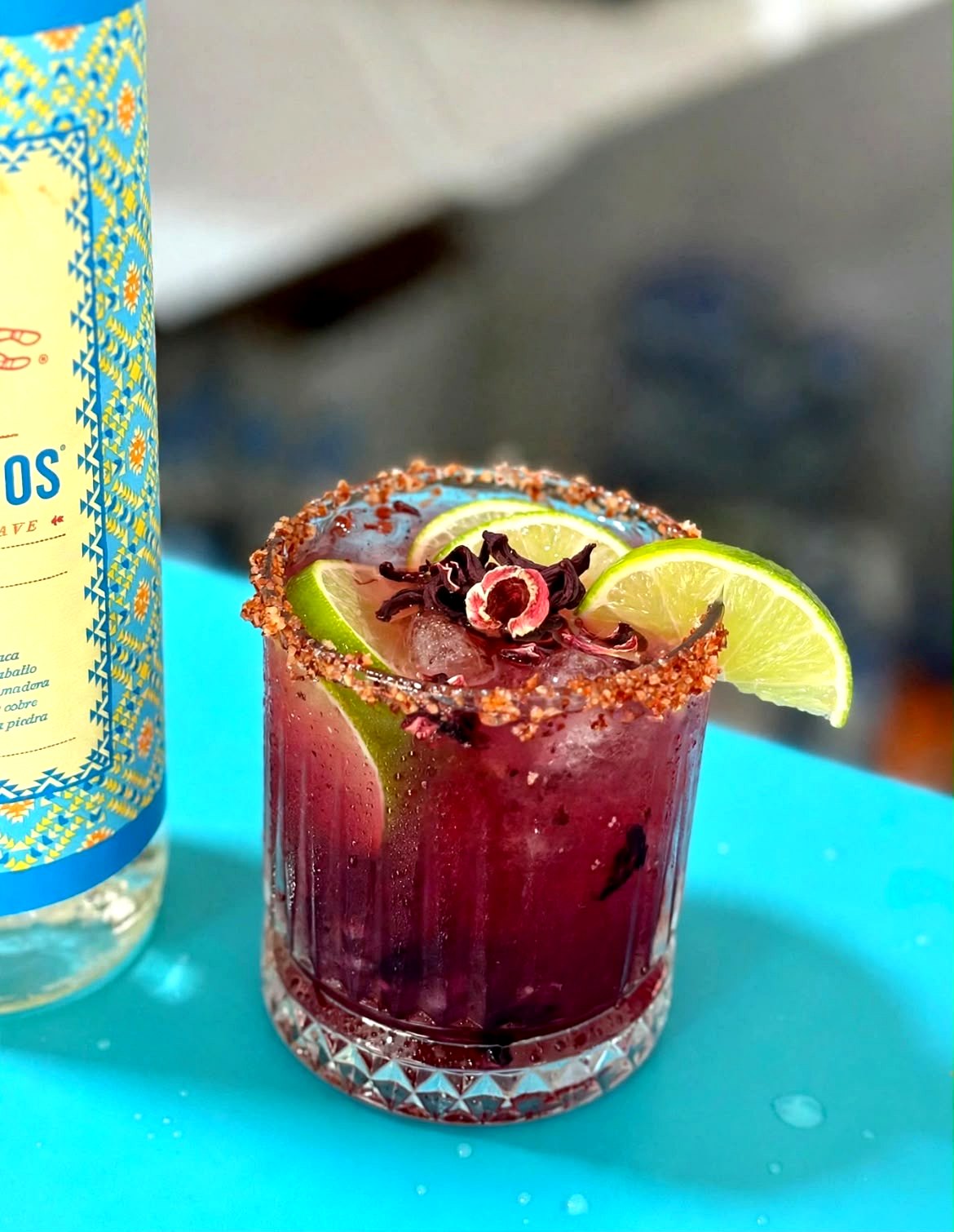 Mezcalito de frutos rojos con escarchado de chile y limón — barra de Restaurante Tita, Playa Azul